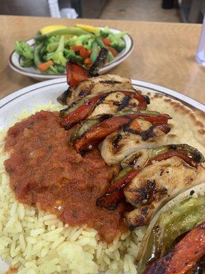 Chicken kebab, rice, red sauce, mixed vegetables