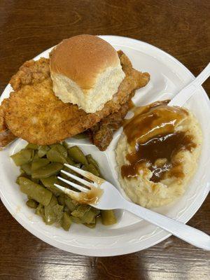 Thursday special 2 pork chops , roll , mashed taters and gravy , green beans