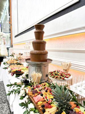 Chocolate fondue fountain for a wedding dessert bar