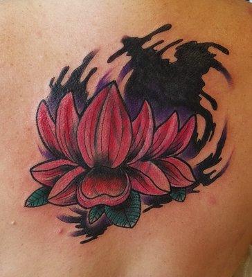 After: covered up an old fading dragon for this beautiful water Lilly.