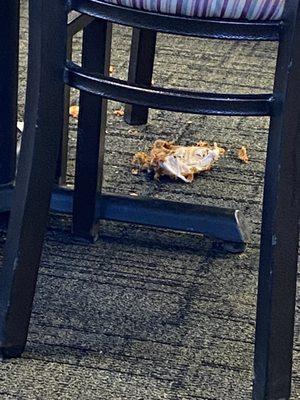 Food falling off garbage table onto floor