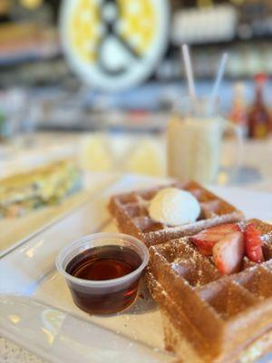 Side of waffles with strawberries & powdered sugar - it melts in your mouth!