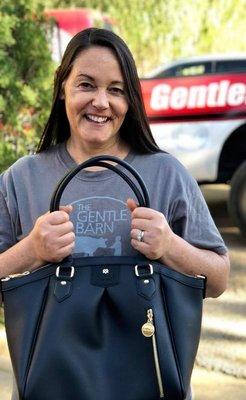 Ellie, founder of The Gentle Barn with her Gunas Madison PE bag