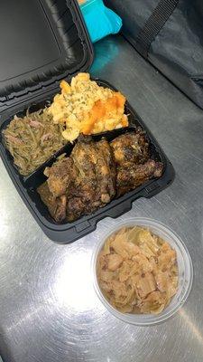 Baked jerk chicken, cabbage, green beans, baked Mac & cheese