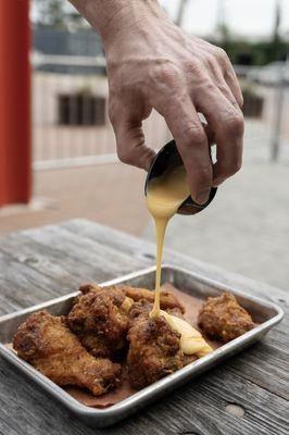 Hatch Green Chile Wings. We serve with our house made Cleats Cheese Sauce. We also recommend the house made ranch or blue cheese