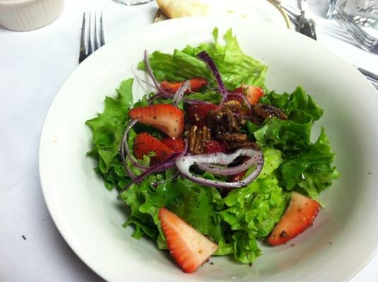 Delicious strawberry salad w/ candied pecans, romaine lettuce, red onion & poppy seed vinaigrette.