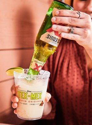 Can’t decide between a beer or a mar­gari­ta? Chuy's frozen lime 'rita topped with a 12oz Mexican beer is the best of both worlds.