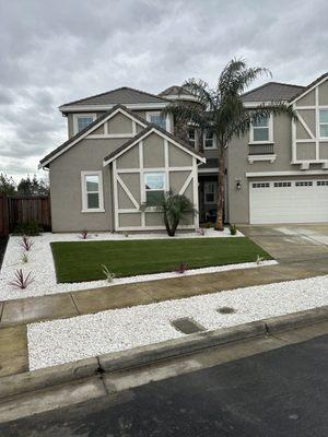 Turf in Brentwood ca with dolomite 3/4 Inch rock and plants with irrigation system