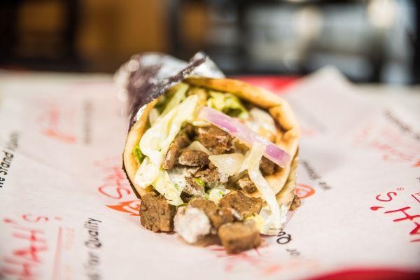 Lamb gyro with your choice of salad and sauces