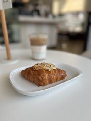 Almond croissant with iced vanilla latte