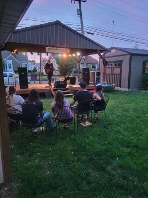 Live music outside the restaurant and bar. On a big grassy area with picnic tables and chairs.