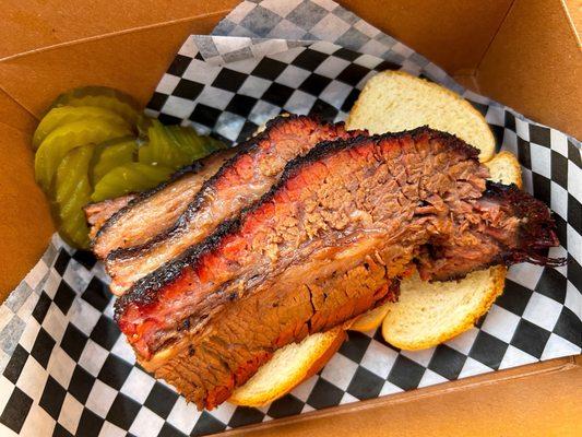 Brisket plate, with bread and pickles. It also came with a side of delicious potato salad.