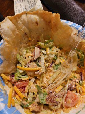 Grilled chicken taco salad with ranch and mild Buffalo sauce.