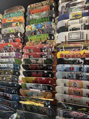 Clean skateshop wall of decks !