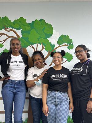 Dr Ruddock and front desk staff, Vanette and Ammy, and medical assistant Tiffany enjoy Dress Down Day