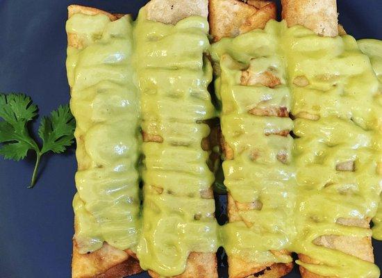 Olvera street taquitos. Freshly rolled and smothered in avocado sauce