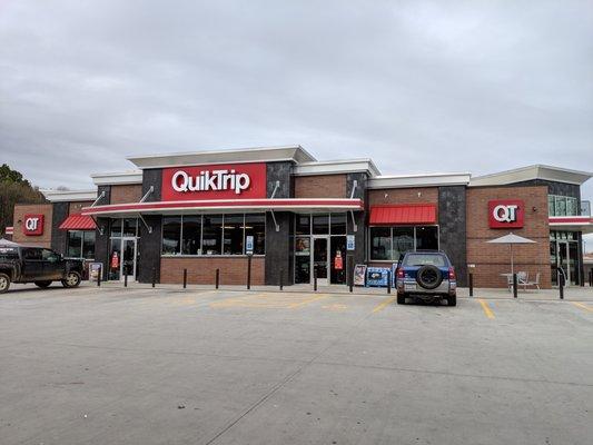 Outside the convenience store. Storefront. Entrance.