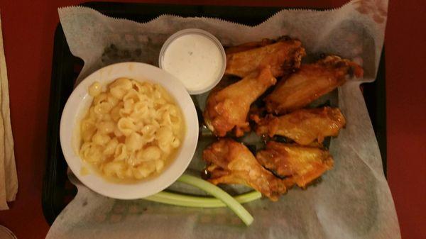 Tough, chewy wings with disappointing mac and cheese.