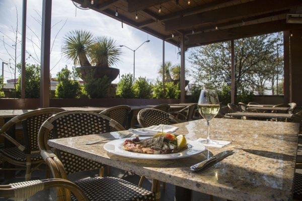 Our own private oasis on Lemmon Avenue...join us at Roux on our patio...