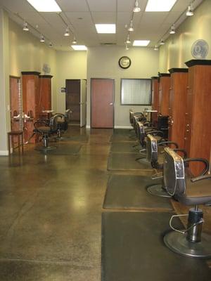 Spacious salon with large guest bathroom.