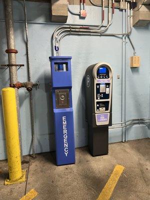 Emergency phone and paying station parking garage level P1