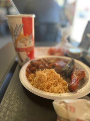 Two piece chicken meal with Charro beans and rice.