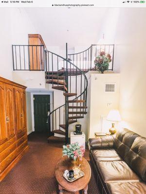 Two level lofts with fireplace and balcony