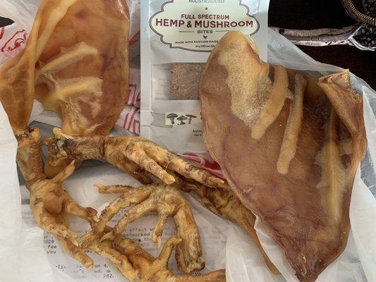 Pig ears, chicken feet, and hemp treats for dogs