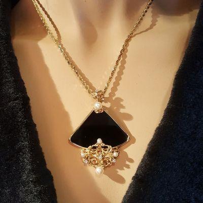 Custom Made and Designed 14K Yellow Gold Onyx, Diamond and Saltwater Cultured Pearl Pendant.

LisaJewelers.com