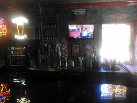 1 of 3 brand new TVS  behind the bar at 8 beers on tap and over 30 other beers and ciders to choose from