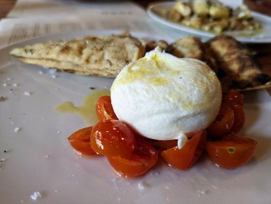 Burrata. $15. Cherry tomato config, everything flatbread.