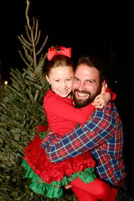 Come on out and pick out a beautiful Fraser Fir and you will be as happy as this little girl for Christmas!