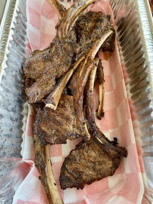 To go lamb chops, seasoned to perfection!  I highly recommend!  Order ahead!