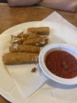 Served exploded mozzarella sticks