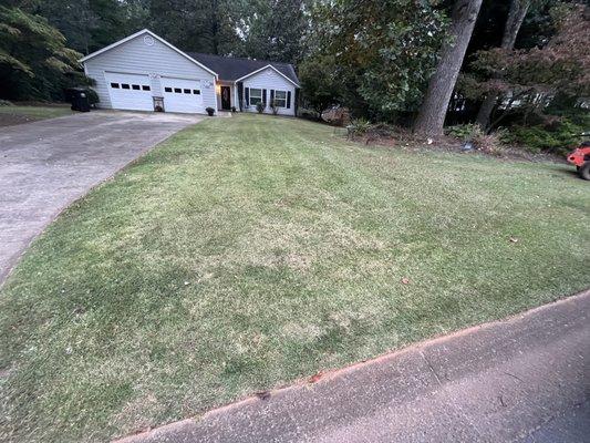 Cutting this lawn and blowing.  Clean up job