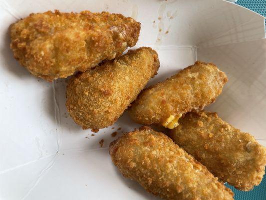 Cheesy Jalapeños- tastes like nacho cheese with Jalapeño pieces that are deep fried.