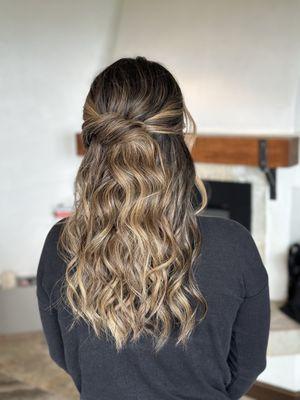 Our bride eloped in Big Sur CA. She requested a half up textured/undone updo.  This was perfect for a beach wedding.