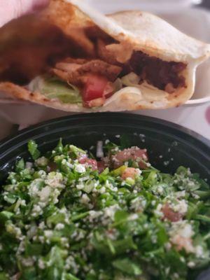 Chicken shawarma pita and tabouli.