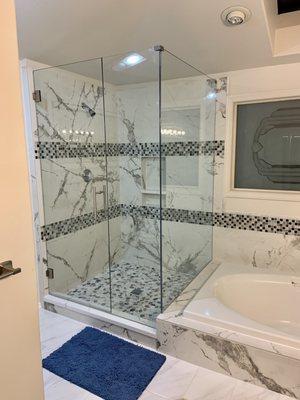 All glass frameless shower enclosure was the icing on the cake for my master bathroom remodel.