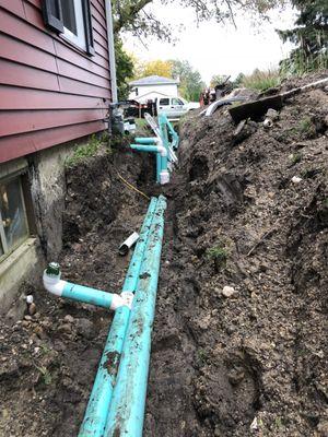 Hooked in 2 sumps, 2 window wells and 2 downspouts