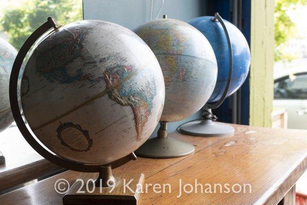 Globes at Astoria Coffeehouse & Bistro. 
 © 2019 Karen Johanson