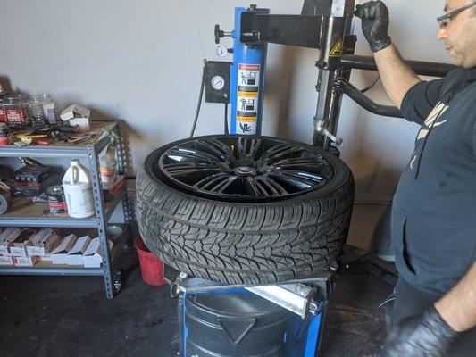 Careful not to scratch the black finish on the new rims and tires for a 2010 Range Rover