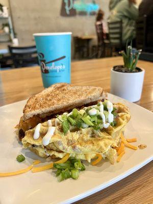 Bacon Lover Omelette and Coconut Cupcake latte.