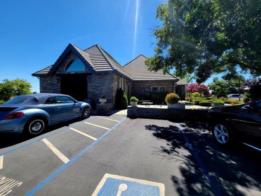 Tasting room in background with parking in foreground