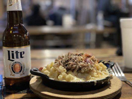 Macaroni and cheese with pulled pork.