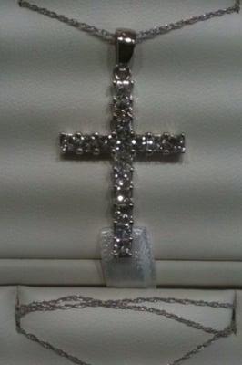 Princess cut Diamond cross pendant.