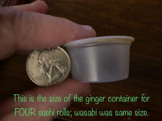 Quarter-size wasabi/ginger container.