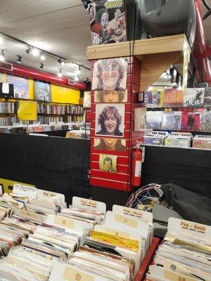 John oversees the overwhelming collection of 45s