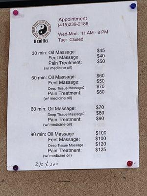 Price list on wall. I had 90 minute oil massage with included a foot soak and hot bean bags.