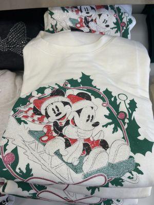 They have Disney sweaters